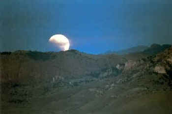 Lunar Eclipse over Sheep Mountain, west of Cody, Wyoming on July 28, 1999